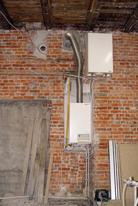 Jak zaplanować instalację CO i CWU w kamienicy z kotłem Viessmann 28 kW?