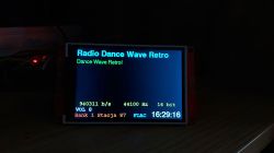 ESP32 S3 module with ILI9488 display showing internet radio interface