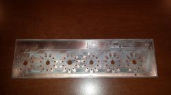 Circuit Board with Holes and Traces Printed circuit board with holes and copper traces.