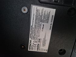Information label on the back of a Hitachi device