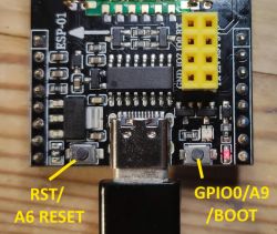 ESP Module with Labeled Buttons and USB-C Connector ESP module with buttons and connectors labeled with yellow descriptions.