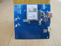 Circuit Board with CR3L Module Circuit board with CR3L module on a wooden background