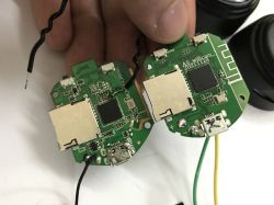 Two round camera circuit boards for A9-type devices with visible chips and micro USB ports.