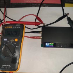 DP100 power supply connected to digital multimeter and test leads