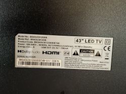 Information label on 43 LED TV with specifications and warning symbols