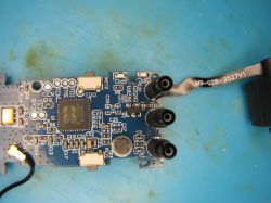 Electronic board with Beken chip and jack connectors PCB with Beken chip and three 3.5 mm jack connectors on a blue surface