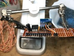Prototype Board with WB2S Module Mounted in a Holder Prototype board with WB2S module mounted in a holder.