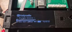 Display of a radio prototype showing Antyradio station info and system parameters