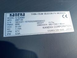 Tabliczka opisowa panelu fotowoltaicznego Kaneka G-EA060 z danymi technicznymi.