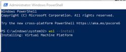 Installing WSL in PowerShell on Windows 10/11 Windows PowerShell window with the WSL installation command active and a message about installing Virtual Machine Platform.