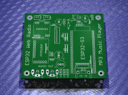3D render of a green PCB labeled for ESP32-S3, PCM5102A, and PAM8403 module installation