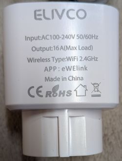 Close-up of ELIVCO label on a white device showing power specs and Wi‑Fi 2.4 GHz details