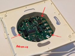 Close-up of Circuit Board with Marked Points Circuit board of the switch with marked unscrewing points.