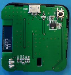 Image of a green printed circuit board with electronic components and a USB connector.