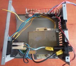 Interior of a transformer-based charger inside an ATX power supply case