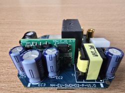 A printed circuit board with various electronic components.
