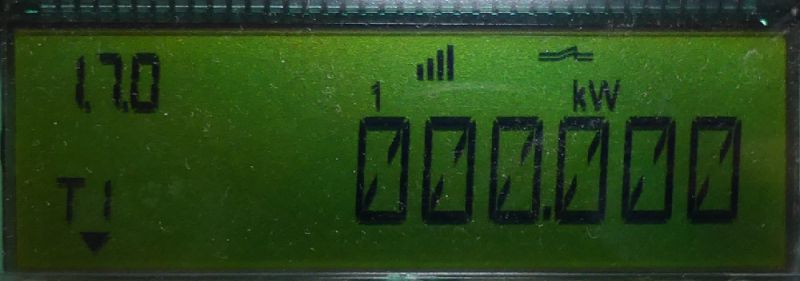 Wyświetlacz licznika energii elektrycznej z odczytem 000000 kW i symbolem sygnału