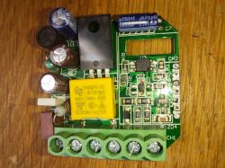 Close-up of a printed circuit board of an electronic device with visible components.
