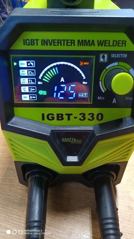 IGBT-330 inverter MMA welder with display and control knob.