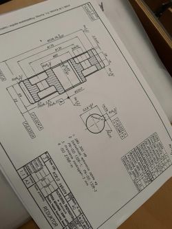 Rysunek techniczny koła zębatego z wymiarami i danymi technicznymi.