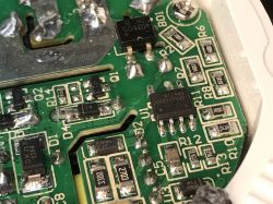 Circuit Board with Electronic Components Close-up of a circuit board with several electronic components, including OB25133JP.