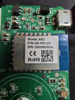 Close-up of an electronic module labeled Model: XR3 on a green circuit board.