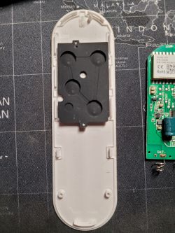 Interior of a plastic casing with electronic components.