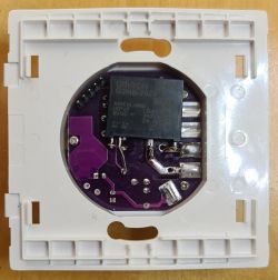 View of an OMRON G3MB-202P electronic relay mounted on a PCB with a plastic base.