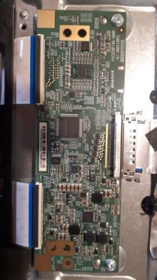 PCB with integrated circuits and ribbon connectors mounted on a metal housing