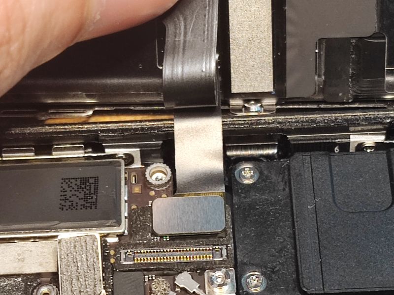 Connectors Inside an iPhone Close-up of connectors inside an open iPhone.