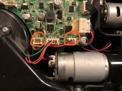 Circuit board with connected wires and two highlighted connectors