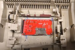 Red 2.4-inch TFT SPI display controller board mounted inside a white device housing