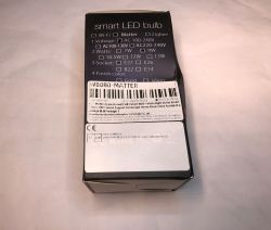 Smart LED bulb packaging with Matter technology.