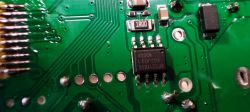 Close-up image of an electronic circuit board with visible components.