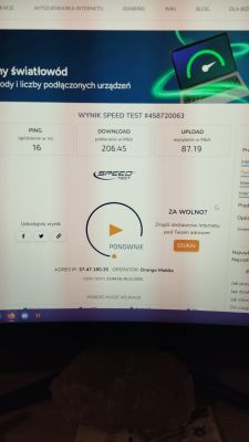 Zrzut ekranu testu prędkości z wynikiem 206,45 Mb/s pobierania i 87,19 Mb/s wysyłania.