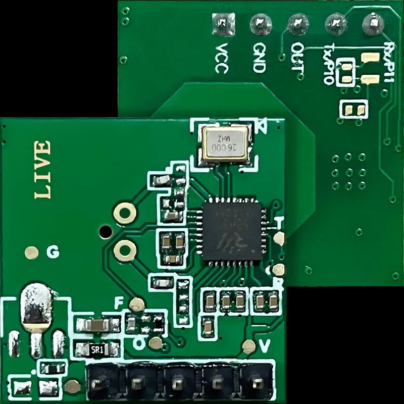 Close-up of two green printed circuit boards (PCBs) with electronic components and connectors.