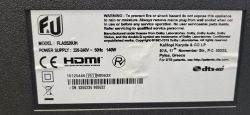 Information label on the back of an F&amp;U FLA5520UH TV showing technical specifications and warnings.