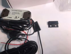 ATLO-GDC2-TUYA Garage Door Controller Kit ATLO-GDC2-TUYA garage door controller kit with sensor, wires, and mounting accessories on a white background.