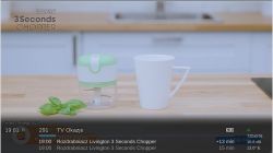 Kadr z programu telewizyjnego prezentującego rozdrabniacz Livington 3 Seconds Chopper, z widocznym paskiem informacyjnym na dole ekranu.