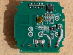 Printed circuit board with various electronic components.