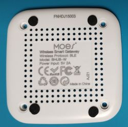 Back of a white Moes Wireless Smart Gateway device with an informational label.