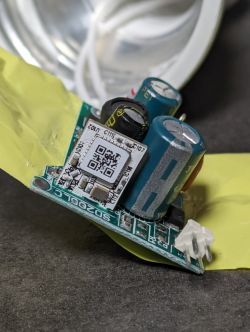 LN882HKI Module on GU10 Bulb Circuit Board Close-up of the LN882HKI electronic module on a GU10 bulb circuit board with electronic components.