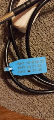Sensor with SHT wires and a label.