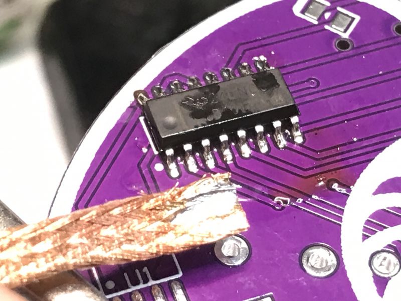 Soldering SOP Chip on PCB Close-up of a PCB with a mounted SOP package chip.