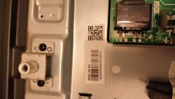 Inside a device: metal chassis with “MODEL: D50-A30” label and a partial PCB marked “HOT”