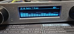 Audio device display showing Radio 7 Mława and sound level bars