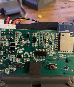 Close-up of a green PCB with a C3S module and various electronic components