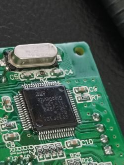 PCB with STM32F105 Chip Close-up of a printed circuit board with an integrated circuit labeled STM32F105.