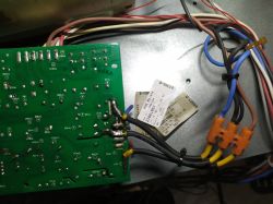 PCB with handwritten labels, wiring, and connectors of an electric oven
