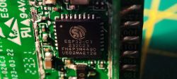 Close-up of an ESP32-C3 chip on an SM-028C3 module.